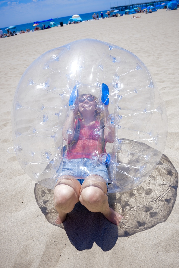 Girl in a bubble zorb on Will ROgers State Beach